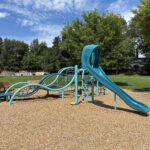 Father Lennon Park Playground for Ages 5-12 featuring slide and rope/belt climber