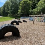 Father Lennon Park Parkour Area with Tires and Fitness Equipment and Skate bowl in the background