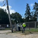 Franciscan Park crews cleaning the Ridge St entrance area