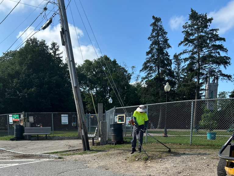 Franciscan Park crews cleaning the Ridge St entrance area
