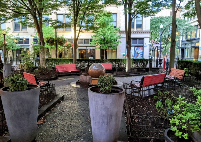 Freeman Park view from inside with Mathewson St downtown decorated