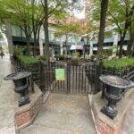 Freeman Park corner entrance gate with nice shade and four benches
