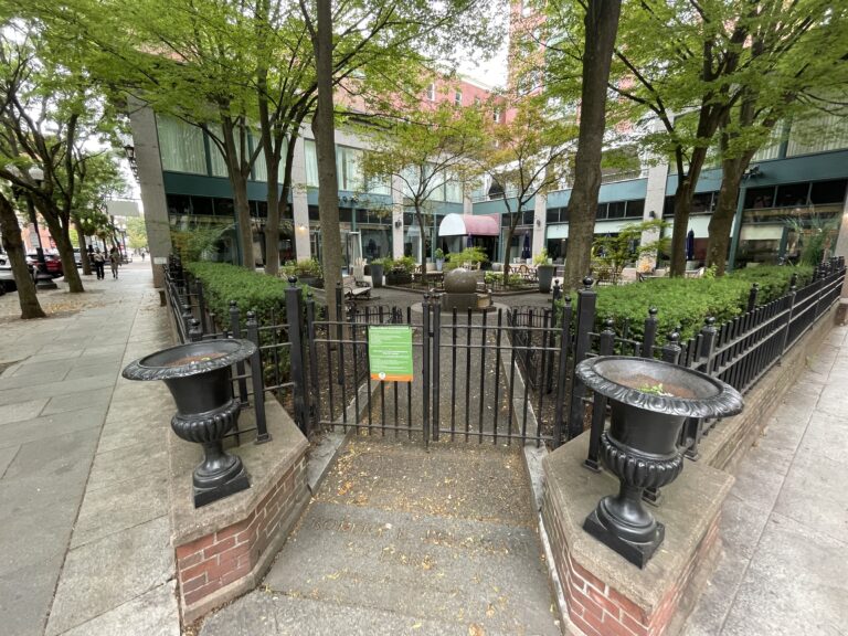 Freeman Park corner entrance gate with nice shade and four benches