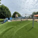 Neutaconkanut playground for ages 2-12 with ADA ramp and synthetic turf berm 2025 improvements