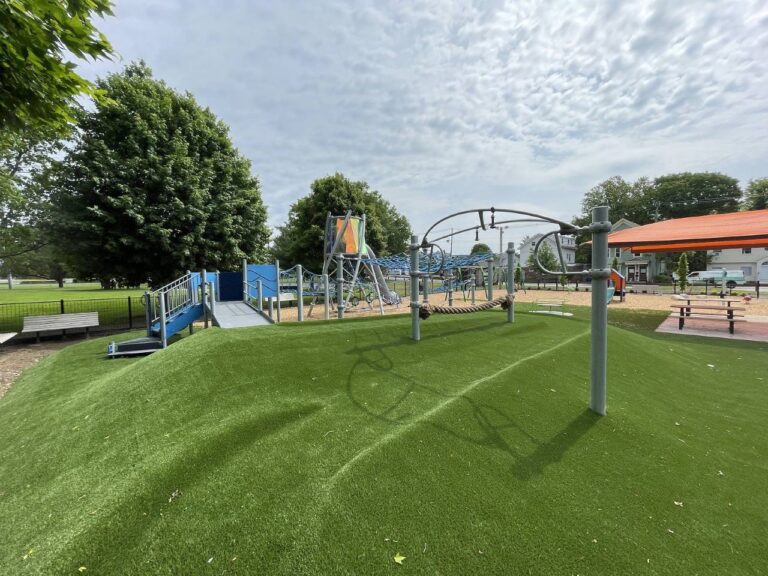 Neutaconkanut playground for ages 2-12 with ADA ramp and synthetic turf berm 2025 improvements
