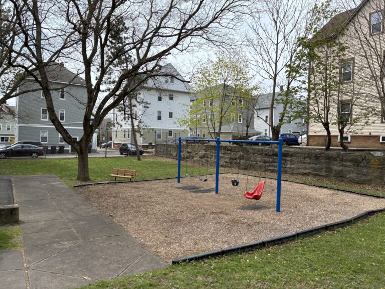 George Araujo Park features a Swing set for ages 2-12, park benches, and historic stone retaining wall