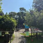 Gladys Potter Park gate on Humboldt Ave with bulletin board