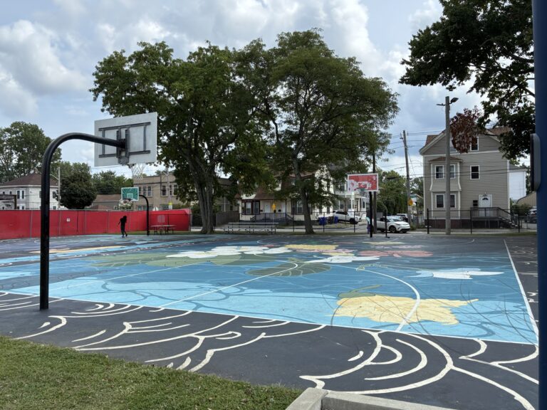 Harriet & Sayles Park basketball courts facing entrance on Oxford St