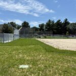 Iola French Park new softball field showing sod installed around the infield skirt with hydroseeding in the outfield