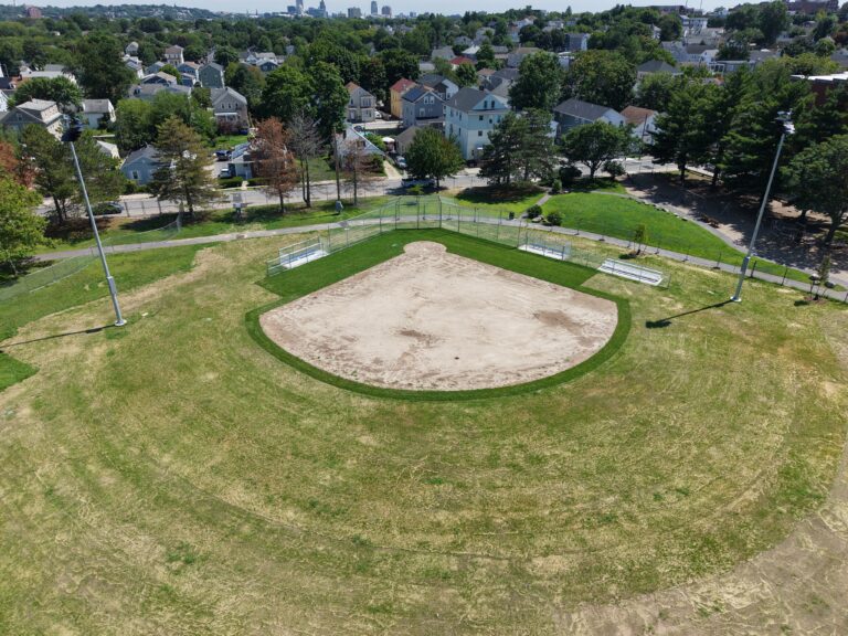 Iola French Park birds eye view of softball field under construction with Providence skyline in the background