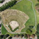 Iola French Park aerial photo showing softball field under construction and walking path completed around the entire park