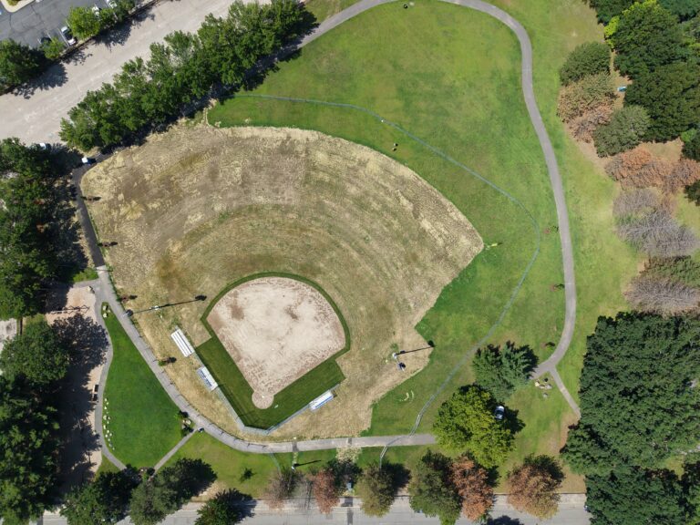Iola French Park aerial photo showing softball field under construction and walking path completed around the entire park