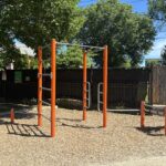 Jacqueline Clements Park fitness area features street workout combination with bench