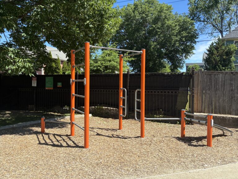Jacqueline Clements Park fitness area features street workout combination with bench