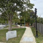 Jacqueline Clements Park "This Neighborhood" east entrance at West Clifford St. The park features lit pathways throughout.