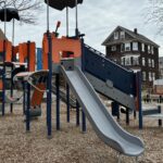 Jennifer Rivera Park play structure for ages 5-12 has one pod accessible via transfer stairs with a straight slide