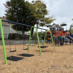 Jennifer Rivera Park playground swings for ages 5-12 including large bird's nest swing