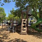 Joslin Park playground equipment for ages 5-12 has a natural treehouse theme