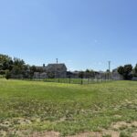 Joslin Park open field giving way to fenced synthetic turf futsal pitch