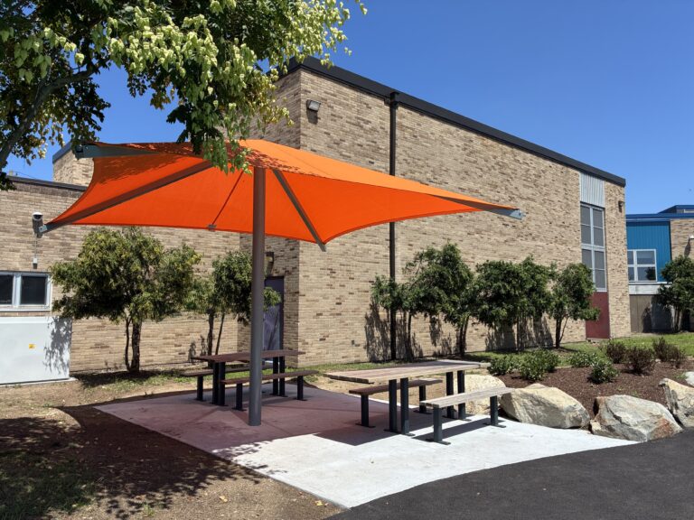 Joslin Park splashpad picnic area with shade sail