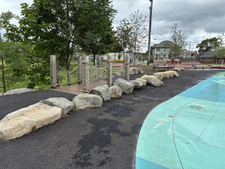 Joslin Park splashpad rebuilt in 2026 retained the original bridge feature separating the waterpark from the rain garden