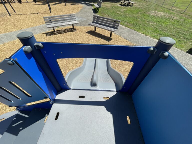 Joe Williams view of park benches from the toddler slide