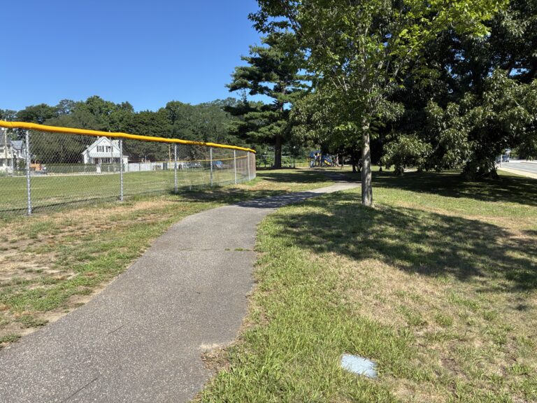 Joe Williams walking path around the outfield towards the playground