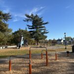 Joe Williams field and playground amenities viewed from the park bench in the fitness area