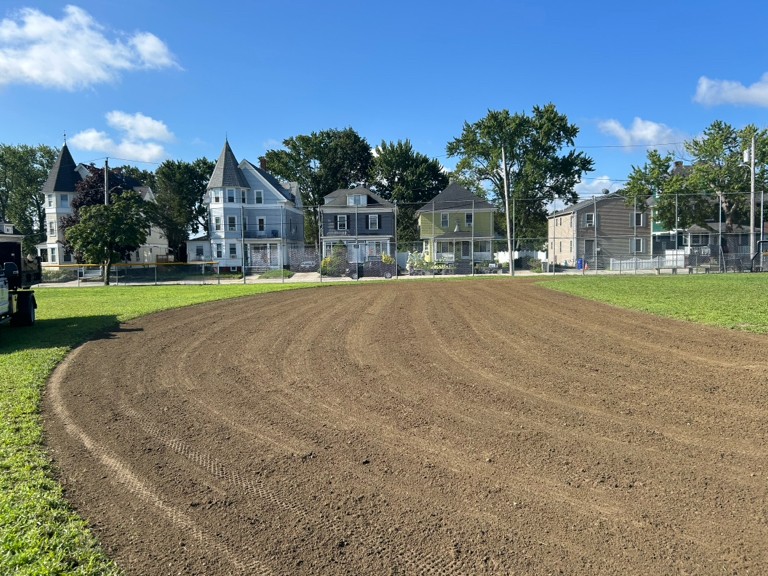 Joe Williams field freshly groomed clay looking at first base from second