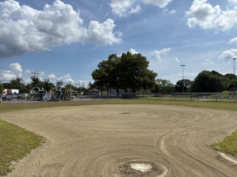 JT Owens T-Ball field from behind home plate with Ed Hooks Playground behind the outfield fence