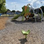JT Owens Park features Ed Hooks Playground with separate play structure with slide and spinner for ages 2-5
