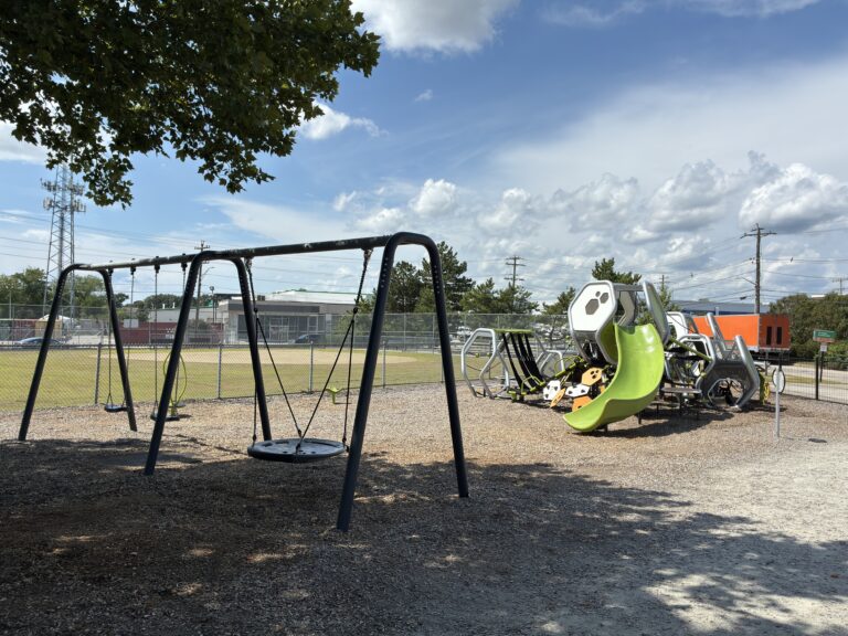 JT Owens Park features Ed Hooks playground with Swings for ages 2-12