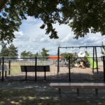 JT Owens Park features Ed Hooks Playground with shade, seating, and play equipment for ages 2-12