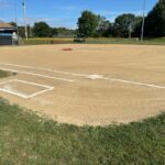 JT Owens Field 1 was converted to an all-clay infield to facilitate a growing Softball program. Looking across the diamond from 1st base shows a portable pitcher's mound added for baseball play