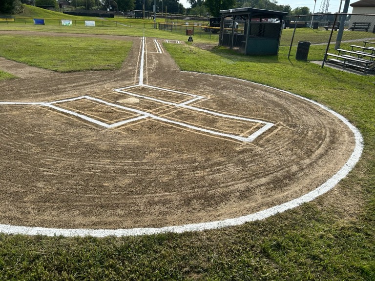 JT Owens Field 2 lined and ready for action, view up the 1st base line from behind home plate