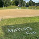 JT Owens Field 1 groomed and lined for 2026 Mayor's Cup facing the softball field from the 1b dugout