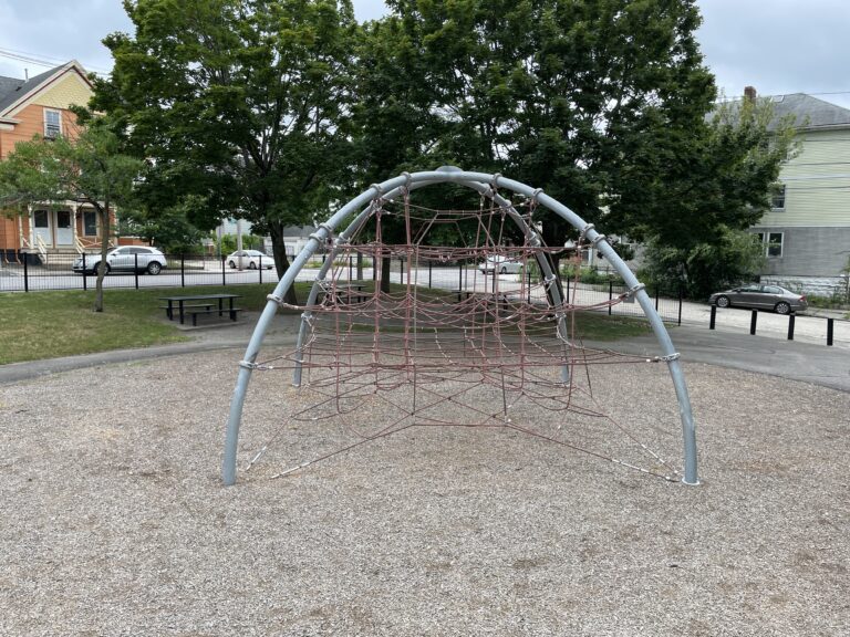 Major Park rope dome play structure for ages 5-12 viewed from atop the separate play structure for ages 2-5