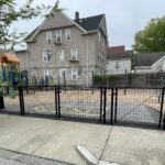 Mattie Smith Park entrance on Taylor St with the 4 belt swings for ages 5-12 at center