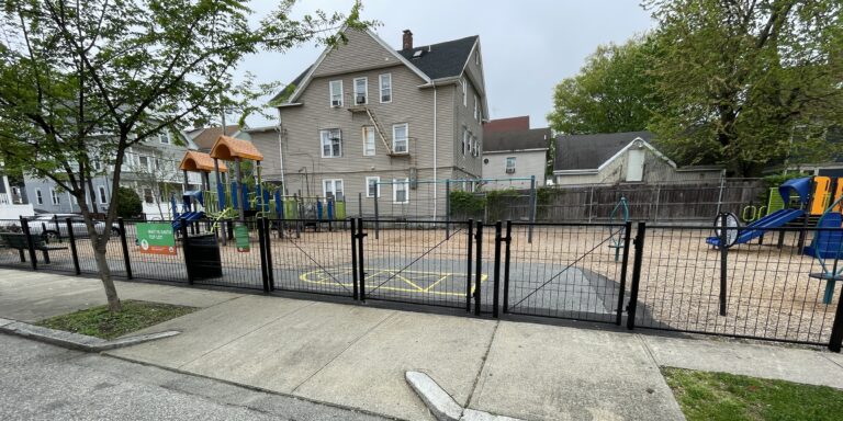 Mattie Smith Park entrance on Taylor St with the 4 belt swings for ages 5-12 at center
