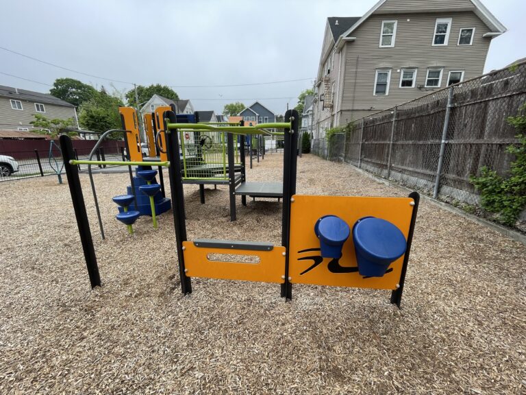 Mattie Smith Park play structure for ages 2-5 features bongos and junior overhead ladder and pullup bar