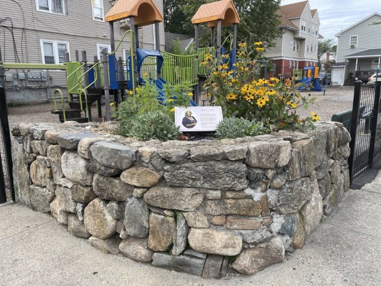 Mattie Smith Park corner stone planter with memorial