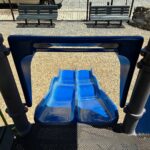 Mattie Smith Park looking down the double slide for ages 5-12 to a pair of park benches