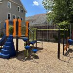 Mattie Smith Park play structure for ages 2-5 features 9 different play elements including a double slide