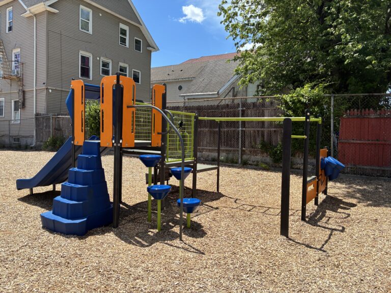 Mattie Smith Park play structure for ages 2-5 features 9 different play elements including a double slide
