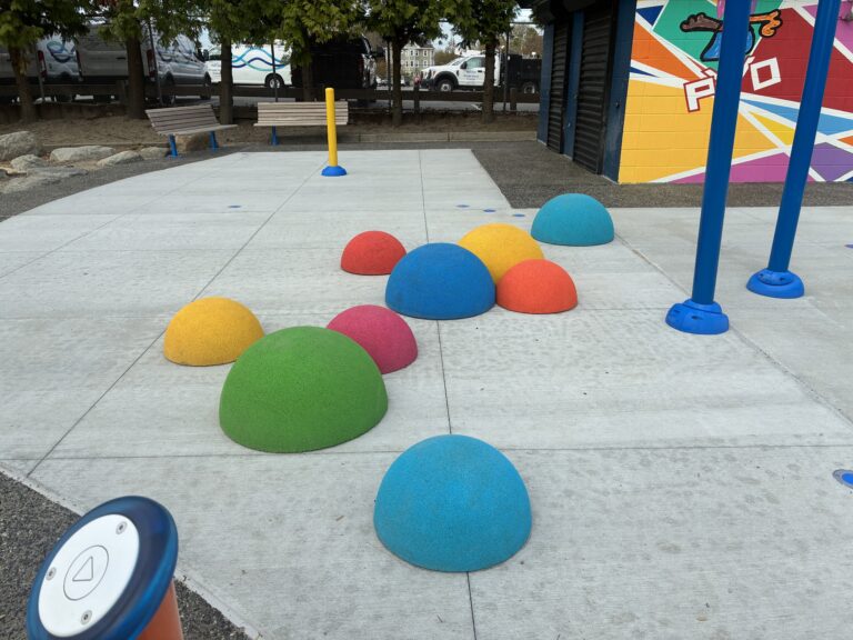 Miguel Luna Park rubber half spheres in the waterpark offer places to hang out