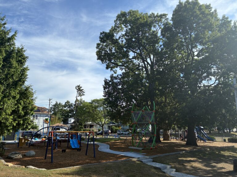 Miguel Luna Park playground for ages 2-12 with significant trees