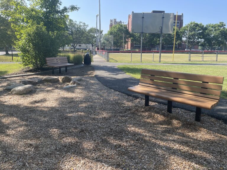 Mt Pleasant Little League Park ample seating with sand play area facing field 1 and the high school