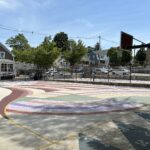 Ninth St Park basketball court facing the street, northeast