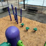 Pastore Park view of play features added in 2026- step pods and bamboo-inspired climbing structures