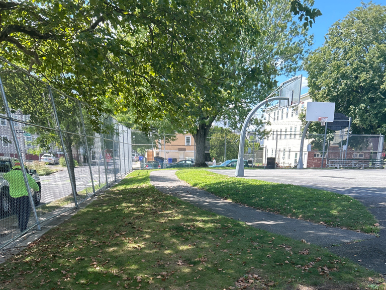 Pastore Park features a paved walking path around the basketball court and playground